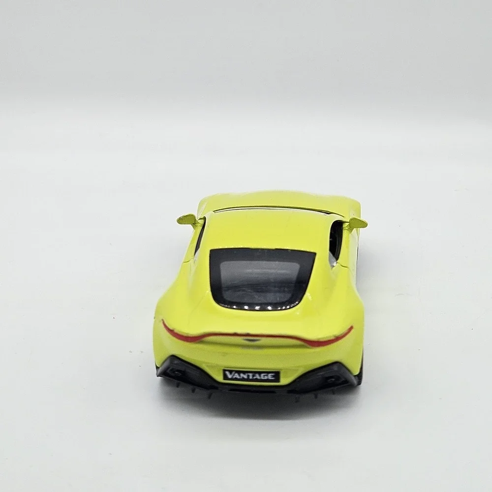 RMZ City Aston Martin Vantage Yellow Diecast Model Car 5 inch Pullback